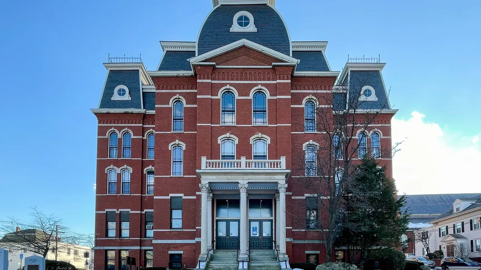 Peabody City Hall, a red-brick Second Empire building with a mansard tower, Peabody, Massachusetts