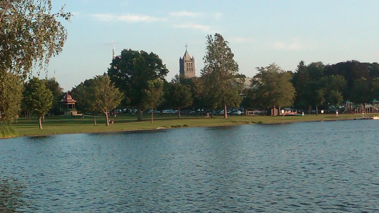Lake Quannapowitt and Wakefield Common with the bandstand and a church tower beyond, Wakefield, Massachusetts